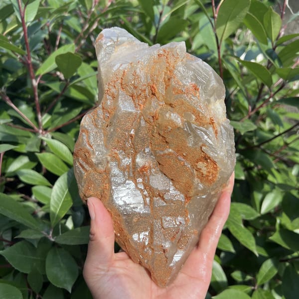 Reverse side of the citrine heavily coated in orange-brown staining