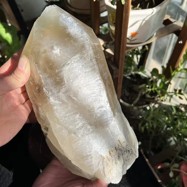 Another hand-held view of the unpolished point with honey colour and frosting