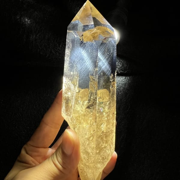 Angled view revealing yellow tones and phantom layers along one edge