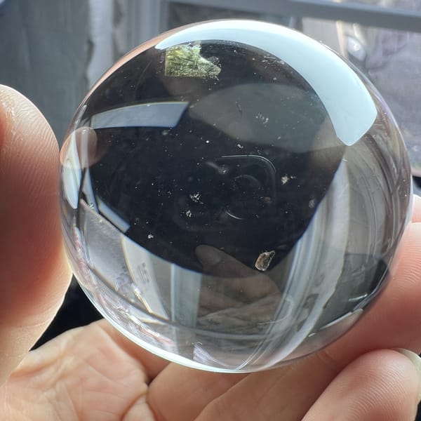 Mica heart sitting high in the sphere near the top edge