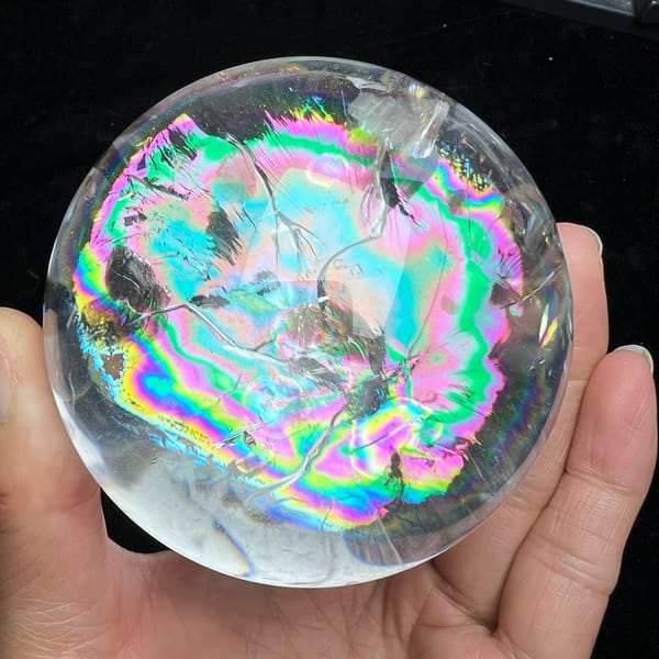 Wide halo of iridescent rainbows seen from a slightly higher angle