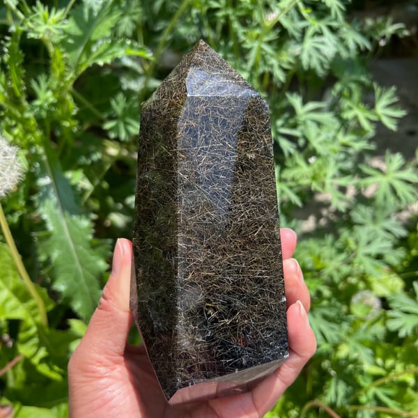 Narrow face of the rutile tower and its polished hexagonal point