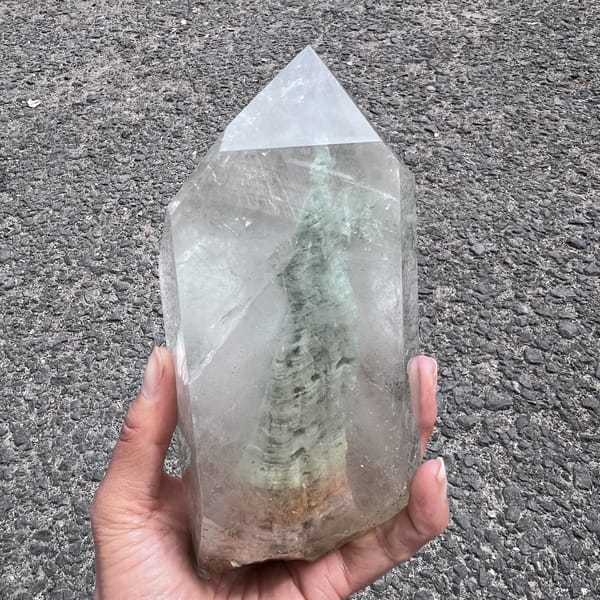 Front face with the green mountain standing in clear quartz