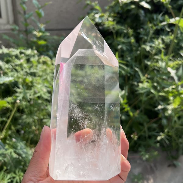 Rear face showing a pale phantom shelf and clear quartz