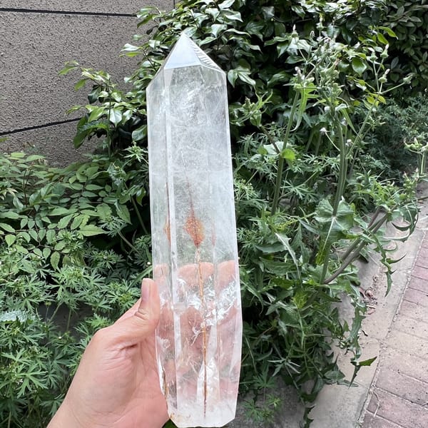 Side face with rutile spray glimpsed through clear quartz