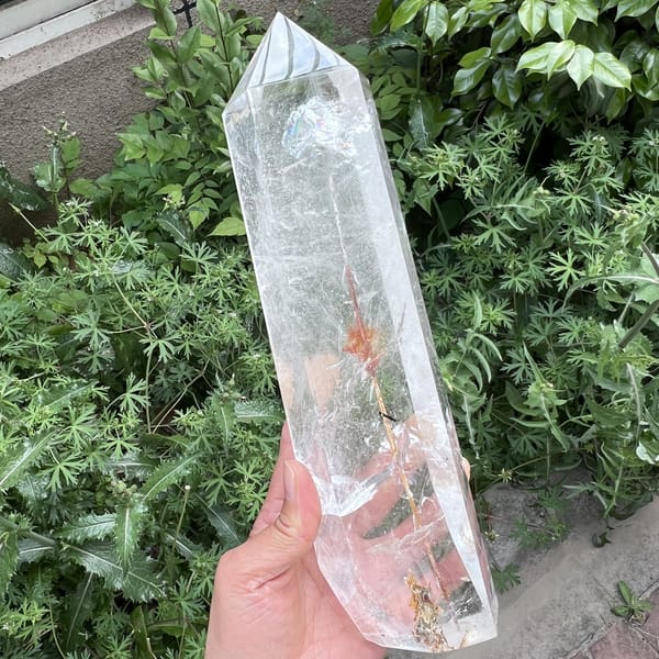 Full-length angled view of the tower and its rutile needle