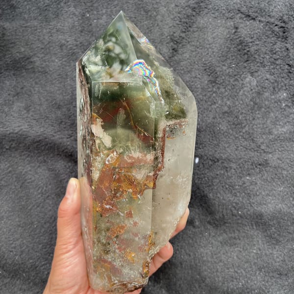 Rainbow flash near the point and orange-stained natural base held upright