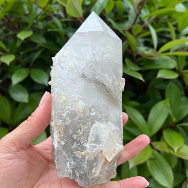 Dark phantom line visible across the middle of the quartz point