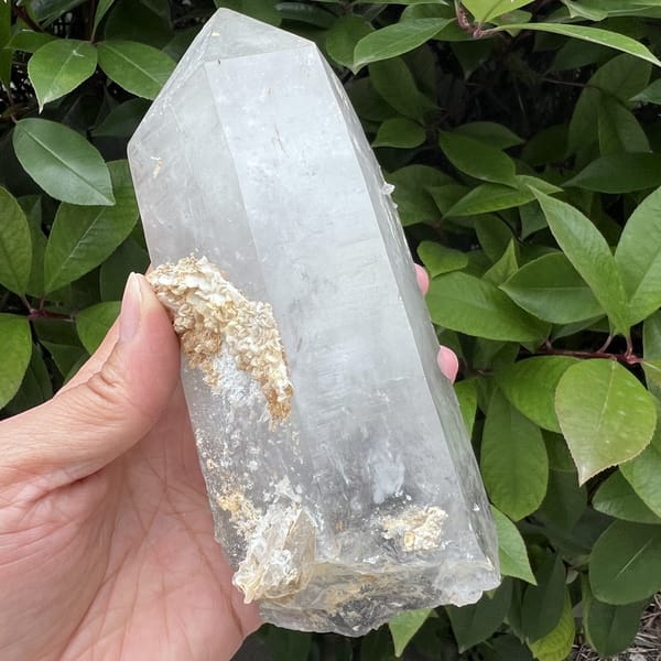 Tall view with crust patches near the base of the crystal