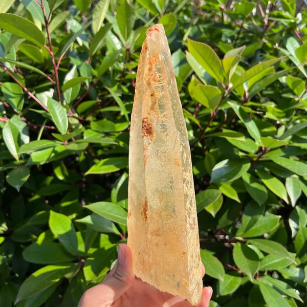 Profile view of the slender tapering crystal in bright sun