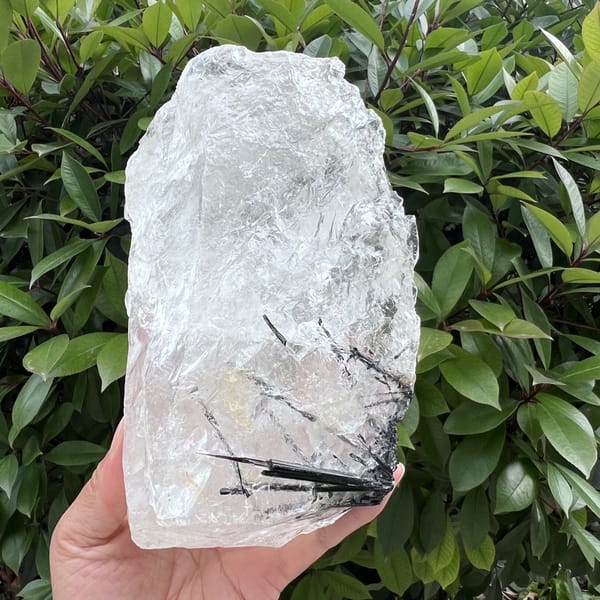 Block turned to show tourmaline sprays from another angle