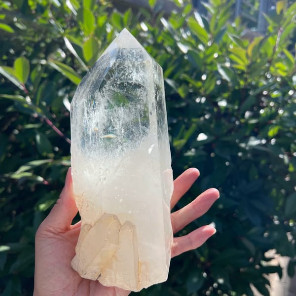Side angle with feathery needles and parallel crystals at the base