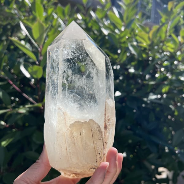 Upper faces and termination with silvery needle veils in sunlight