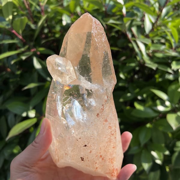 Clear quartz with the scepter crystal on the left and inner veils visible