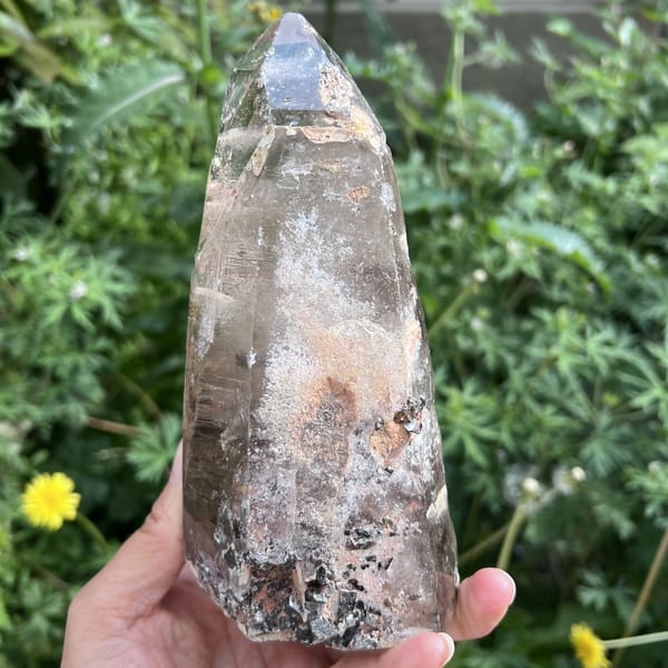 Back of the freeform quartz with a misty inclusion cloud