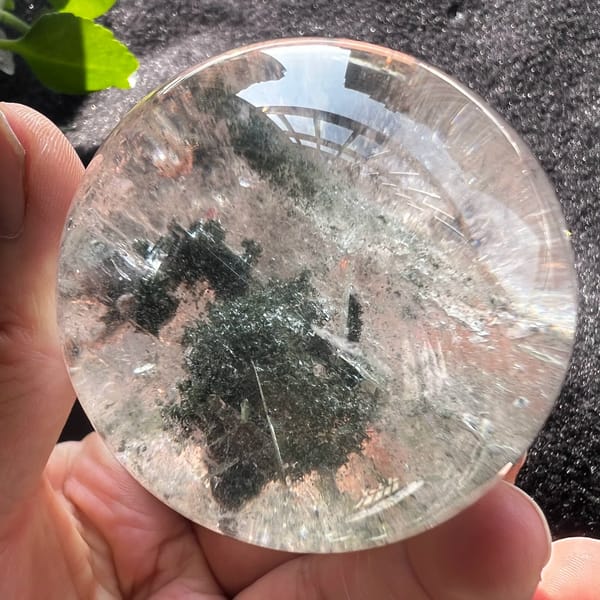 Polished sphere with dense green phantom and clear surrounding quartz