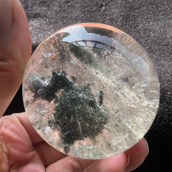 Sphere viewed from the side with green phantom and needle inclusions