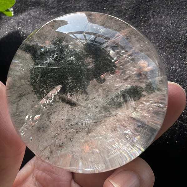 Sphere with green phantom near the top and a clear lower zone