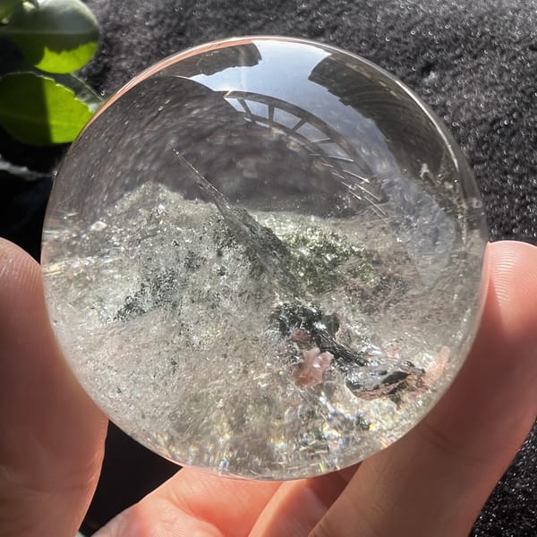 Sphere viewed edge-on with a layer of green phantom sand