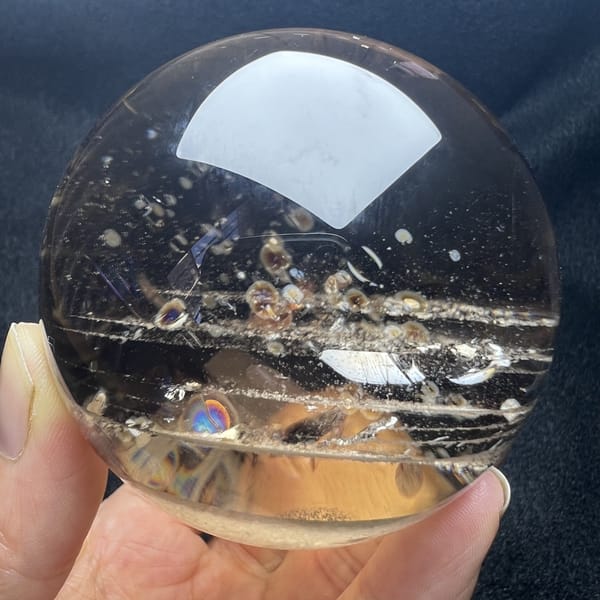 Himalayan smoky sphere showing stacked phantom planes and bright reflections