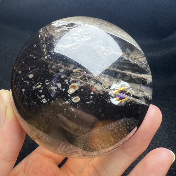Smoky sphere with phantom planes and rainbow near the right edge