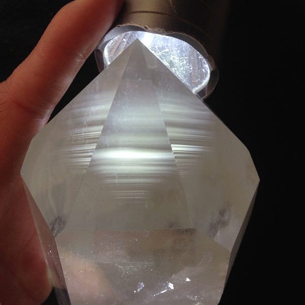 Layered phantom pyramids visible in the tip under a bright flashlight