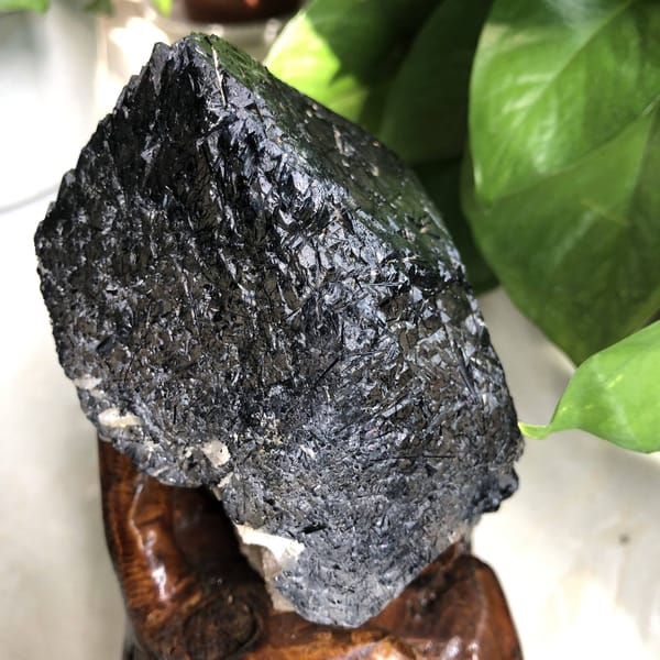 Rough crystal showing the textured, needle-studded natural surface