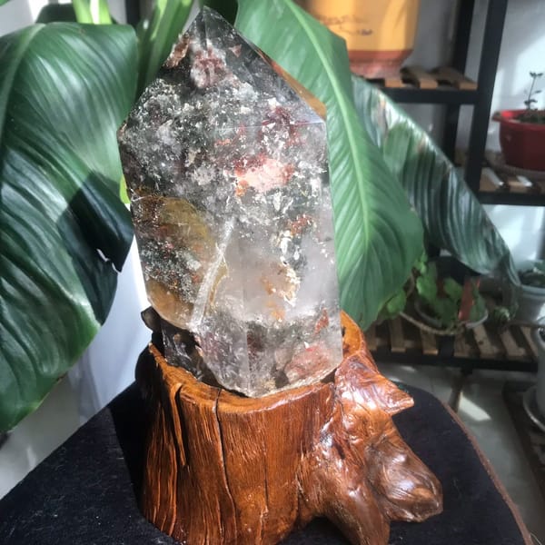Amber-gold zone and red patches seen through a side face