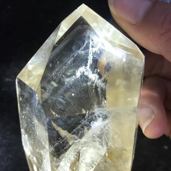 Termination close-up showing the inner crystal and a white phantom streak