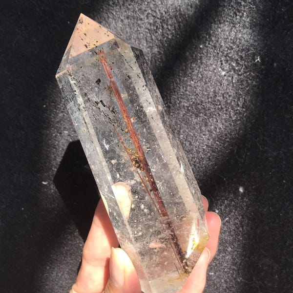Tilted view of the copper rutile line and polished prism faces