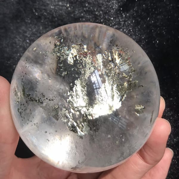 Upright view of the chalcopyrite tree in the hand-held sphere