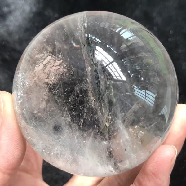 Reverse side of the sphere with a fine internal veil crossing it