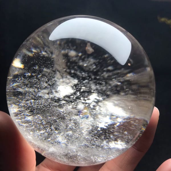 Snowy haze and white flecks filling the middle of the sphere