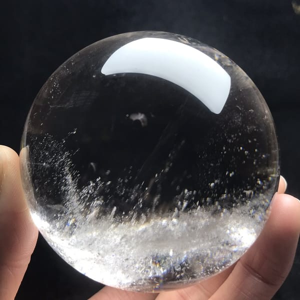Water-clear upper half above a misty band of inclusions