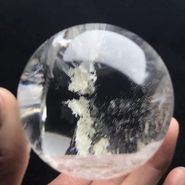 White phantom clusters with green specks in a clear section