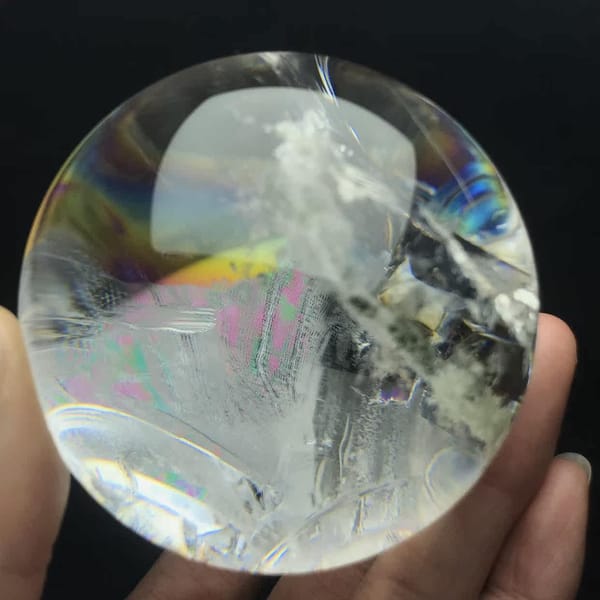 Rainbow band crossing white phantom layers in the garden sphere