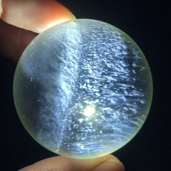 Band dividing two fields of blue needles in the citrine