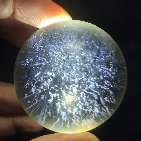 Starry scatter of blue needles across the whole sphere