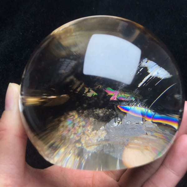 Rainbow flashing along a fracture near the top of the dome