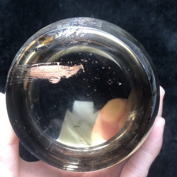 Flat base seen from below with a pinkish streak inside