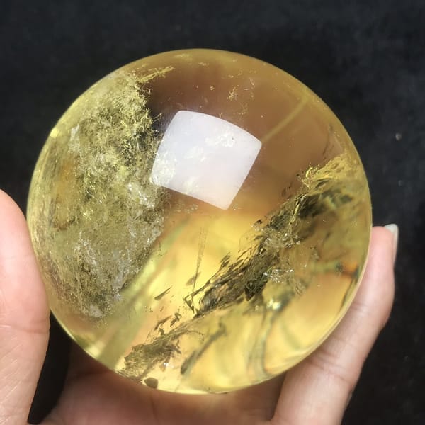 Veil streak and frosty patch on the edge of the citrine