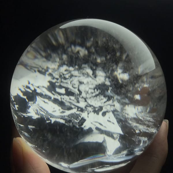 Close front view of interlocking white and clear zones in the crystal ball