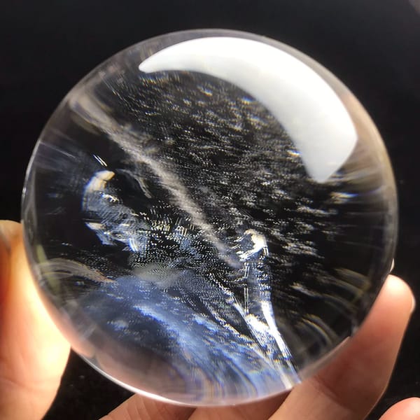 Diagonal veil above swirling blue-tinted clouds in the quartz