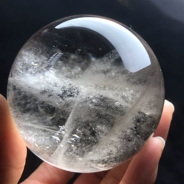 Horizontal misty band and crossing veil in smoky quartz