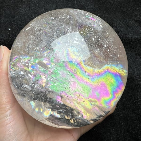 Long green and pink rainbow wave across the middle of the ball