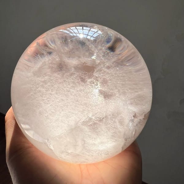 Backlit view of the sphere looking down into the cotton-like cloud