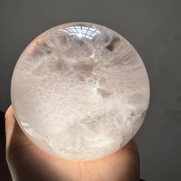 Sparkling cloud inclusions seen from above in strong sunlight