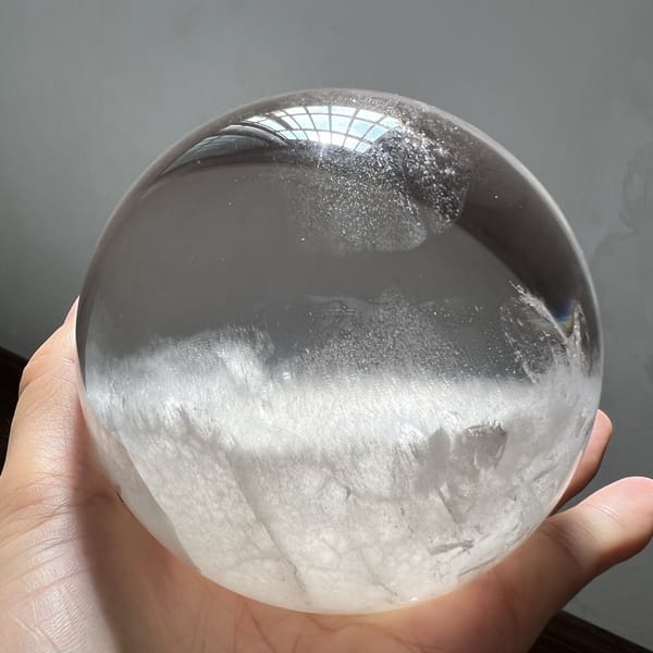 Cloud bank with an even top edge across the large quartz ball