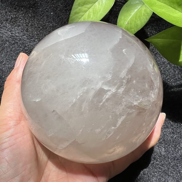 Sphere turned to show the dense white misty side
