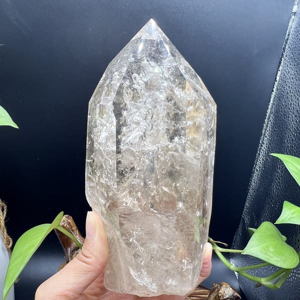 Back of the quartz point showing its broad face and rough base
